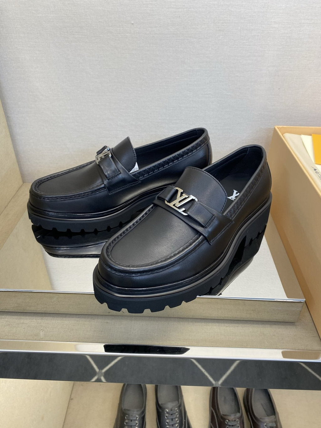 Louis Vuitton Metal Hardware Loafers — front