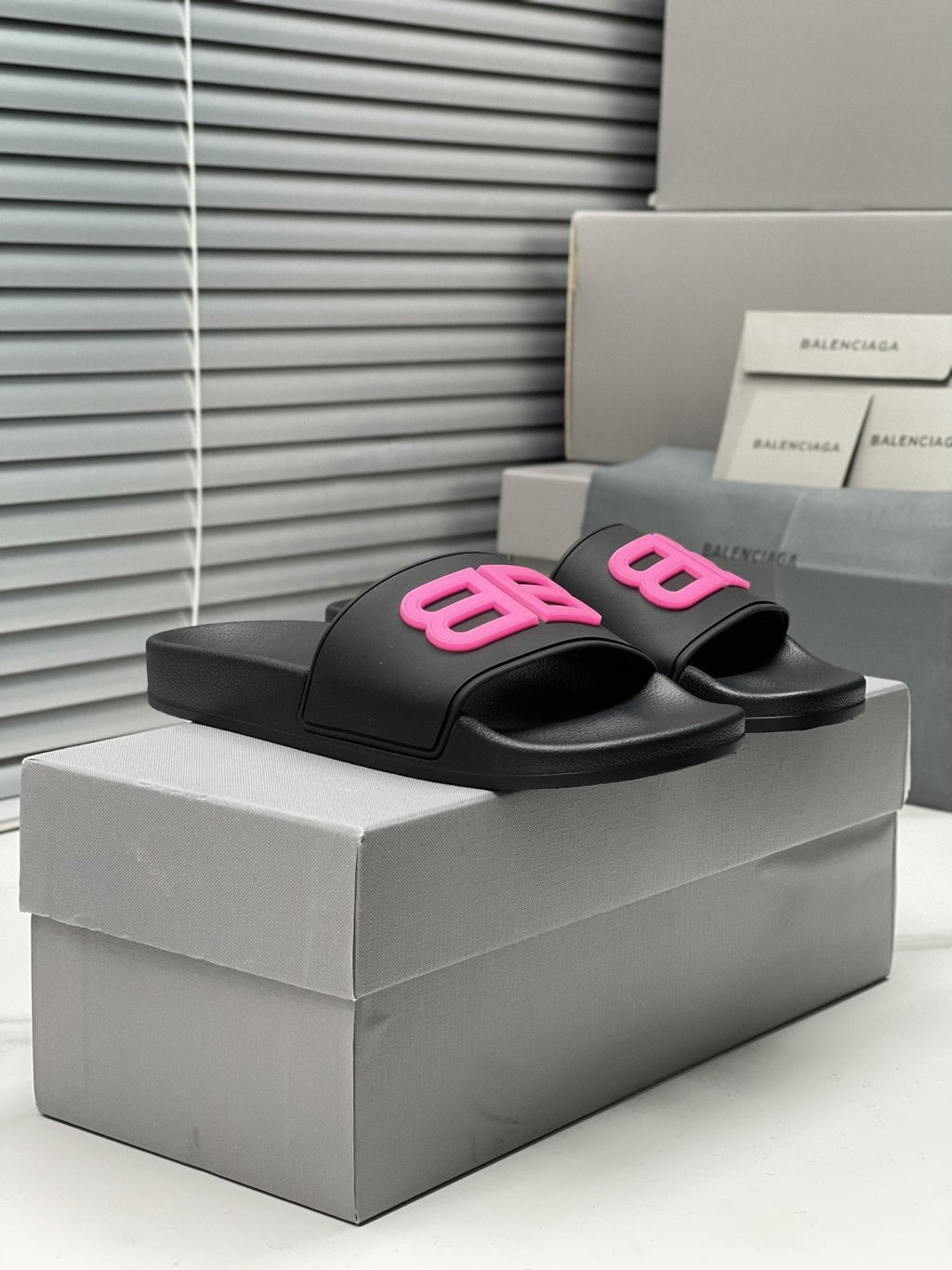 Balenciaga Raised Motif Slide Sandals — side