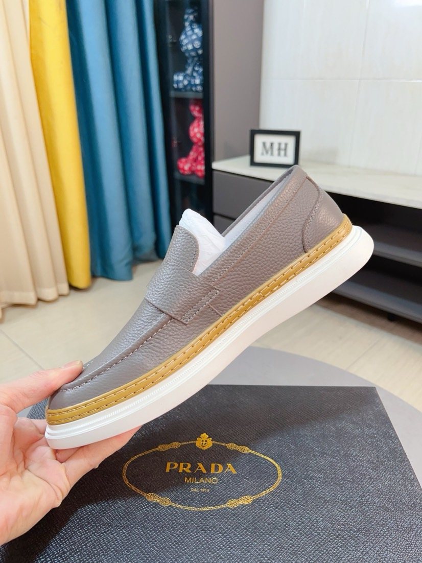 Prada Textured Slip-On Shoes — side
