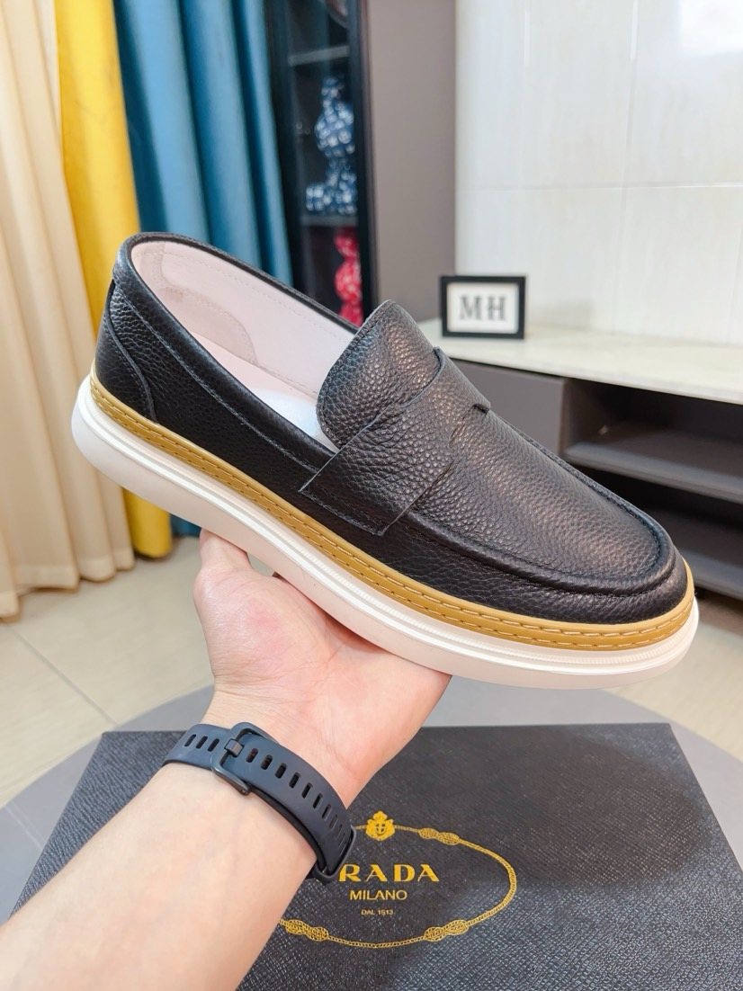 Prada Textured Slip-On Shoes — side