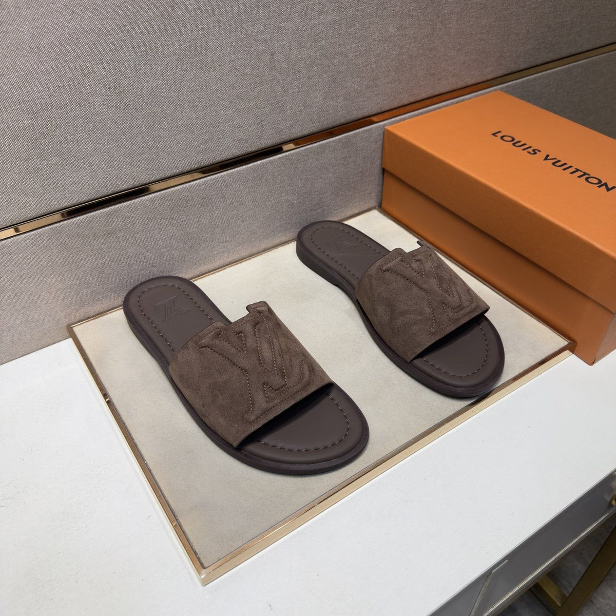 Louis Vuitton Embossed Strap Slide Sandals — hero