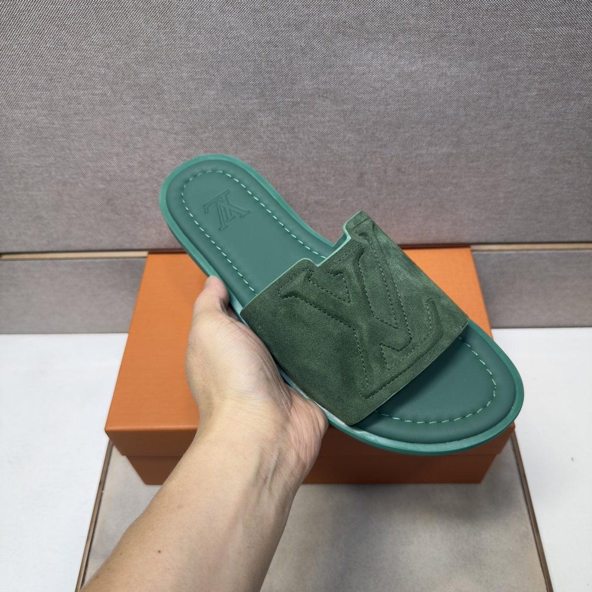 Louis Vuitton Embossed Strap Slide Sandals — model