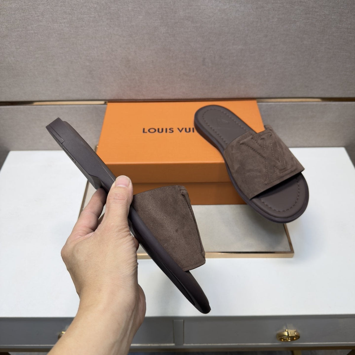 Louis Vuitton Embossed Strap Slide Sandals — model