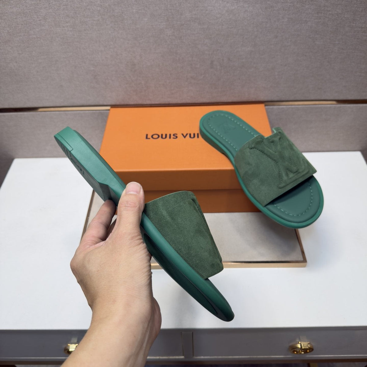 Louis Vuitton Embossed Strap Slide Sandals — model