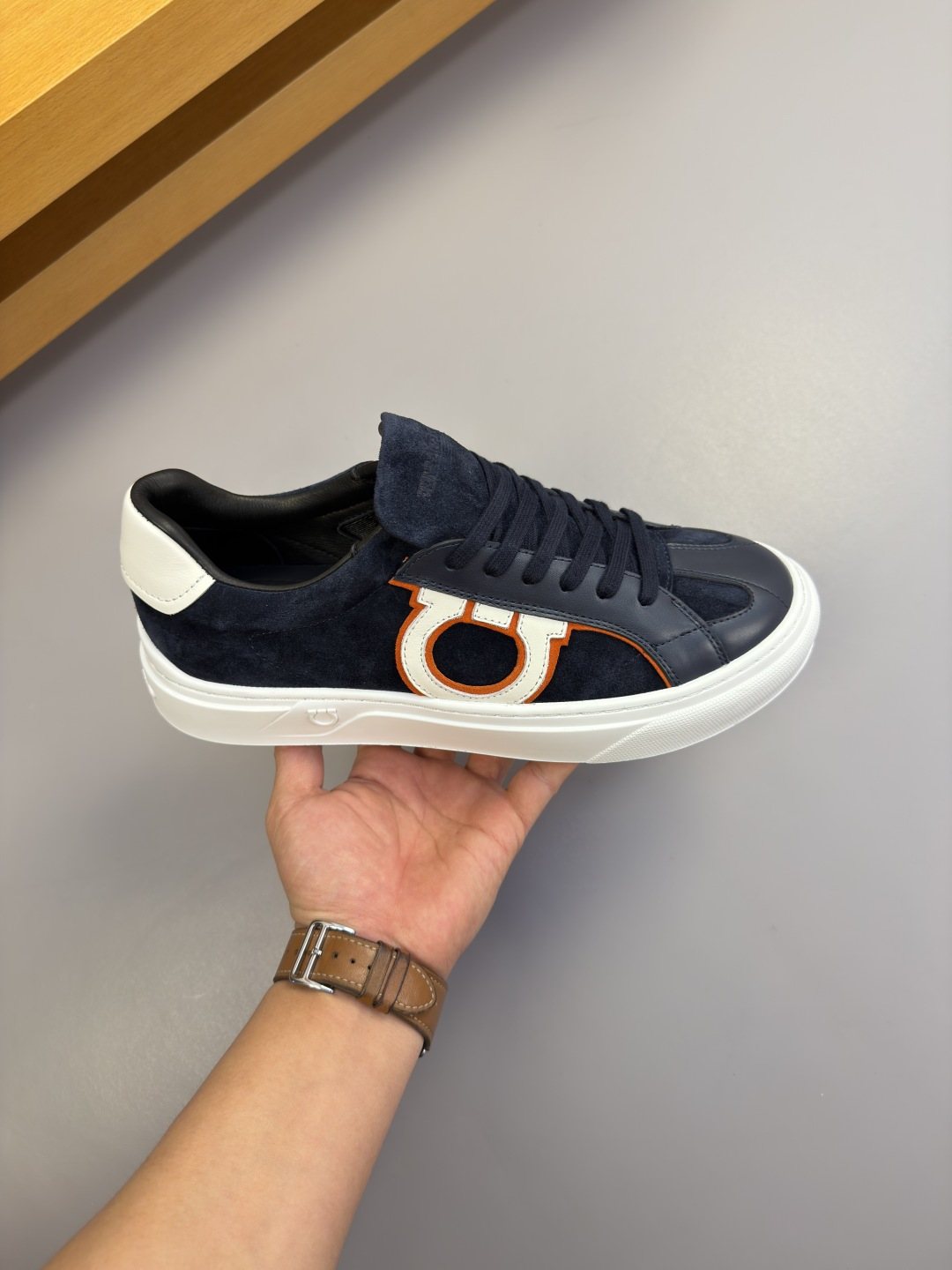 Ferragamo Contrast-Trim Low-Top Sneakers — model