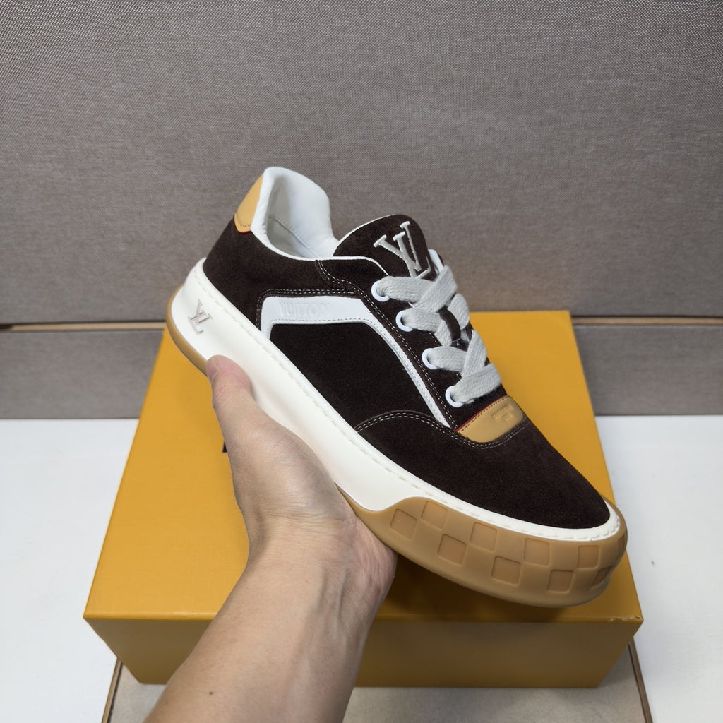 Louis Vuitton Paneled Low-Top Sneakers — model