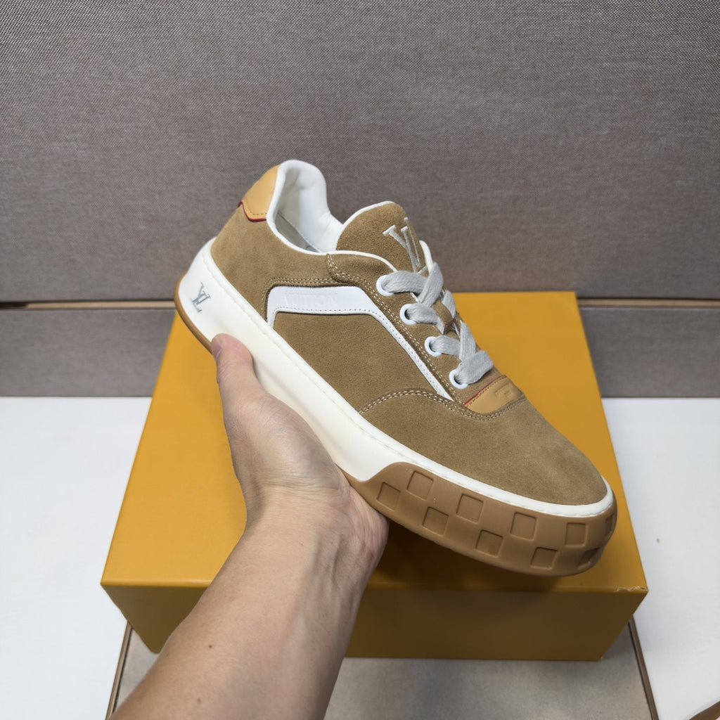 Louis Vuitton Paneled Low-Top Sneakers — model