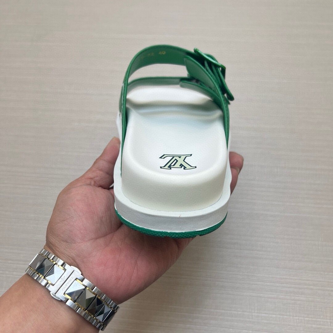 Louis Vuitton Double-Buckle Slide Sandals — model