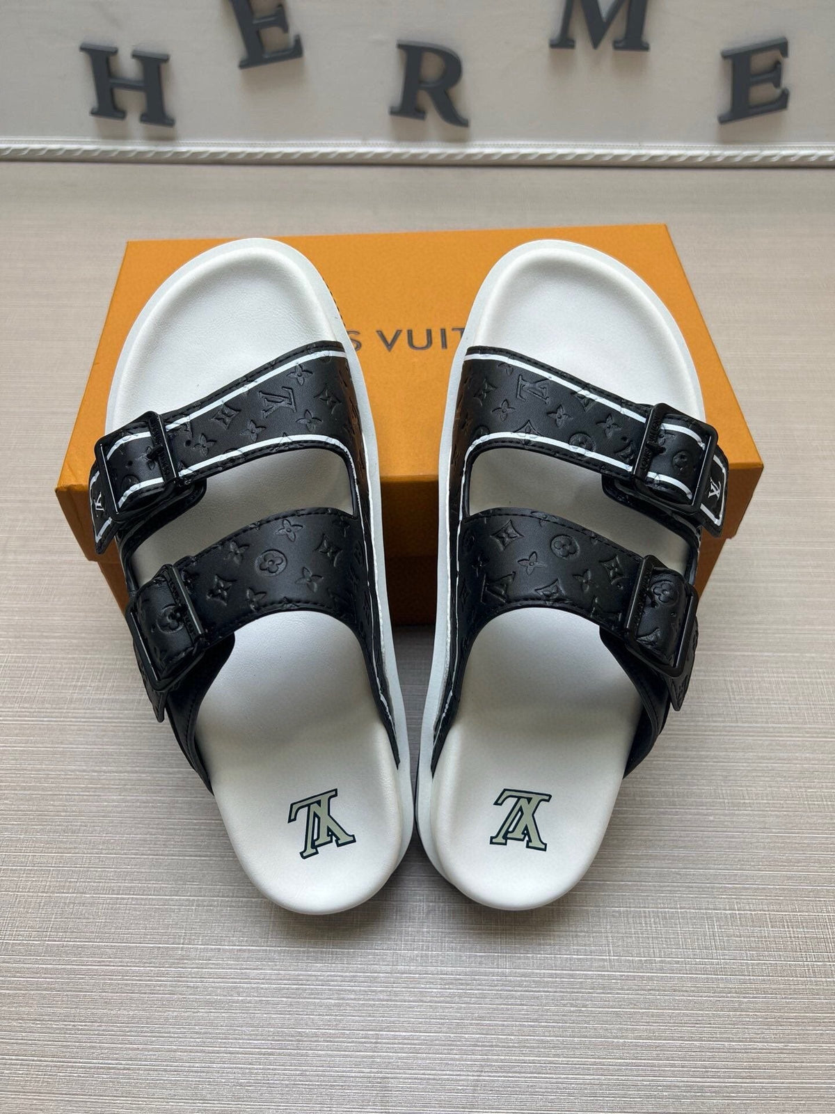 Louis Vuitton Double-Buckle Slide Sandals — hero