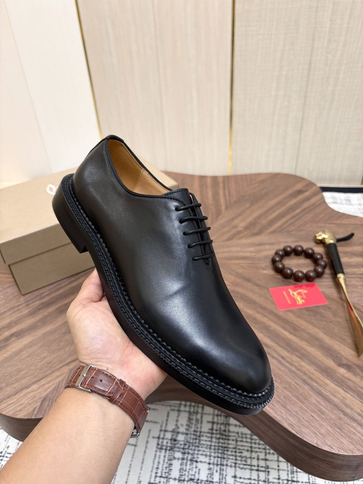 Black Lace-Up Dress Shoes with Red Outsole — model