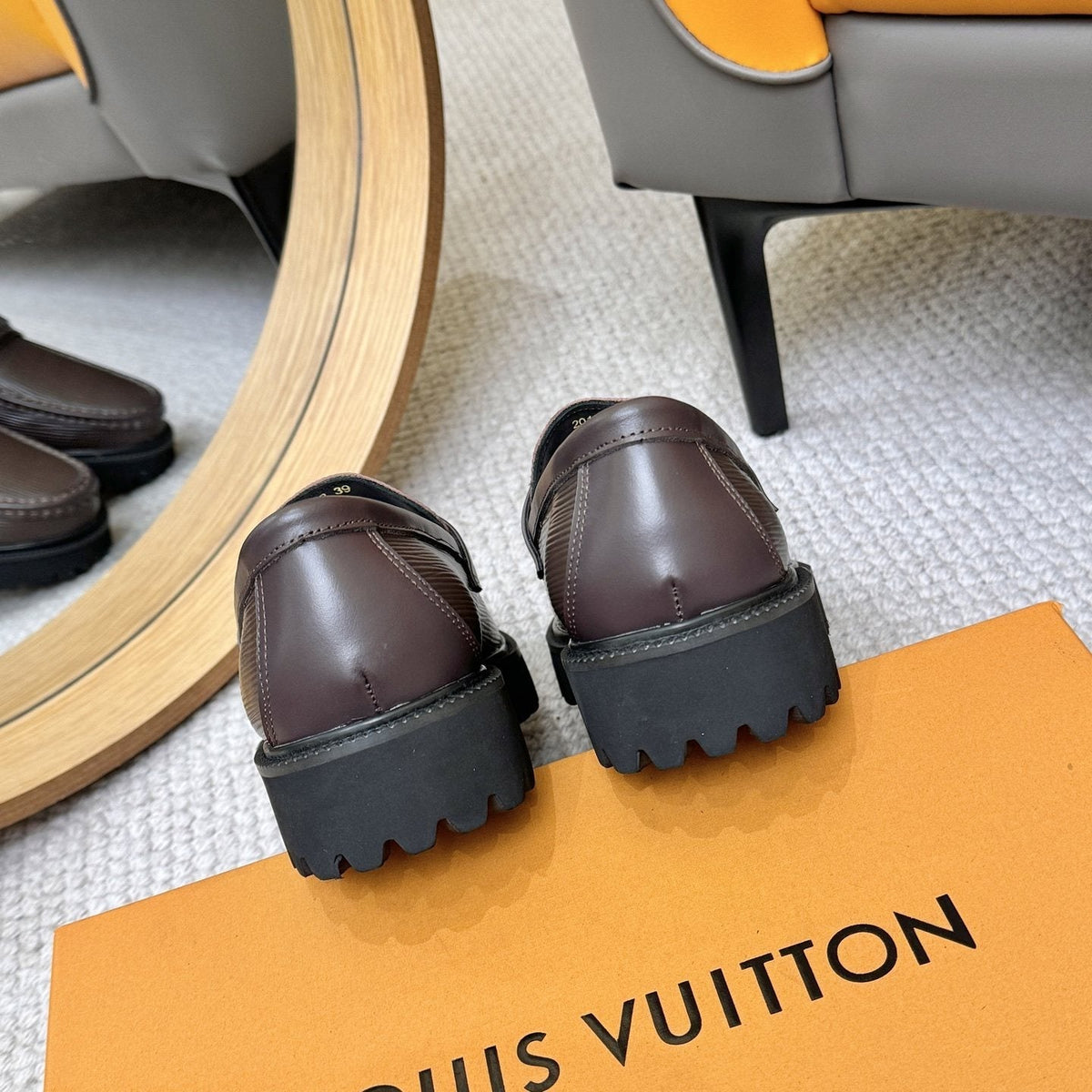 Louis Vuitton Textured Lug Sole Loafers — back