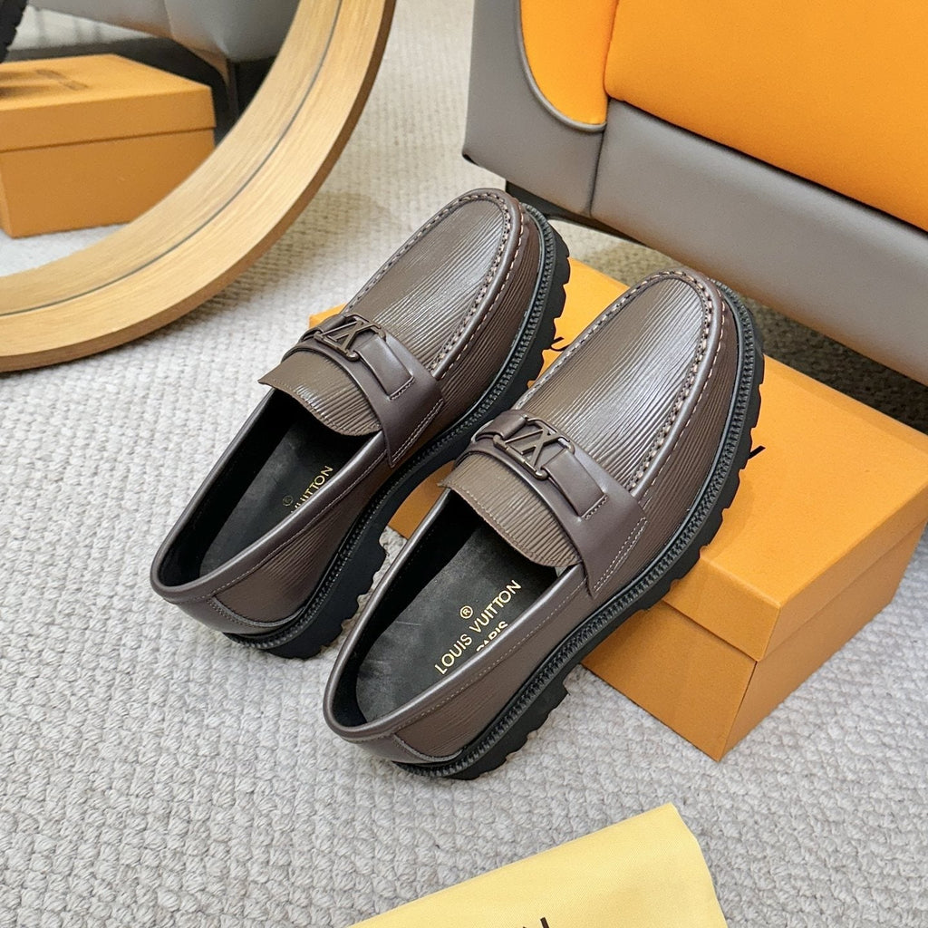 Louis Vuitton Textured Lug Sole Loafers — back