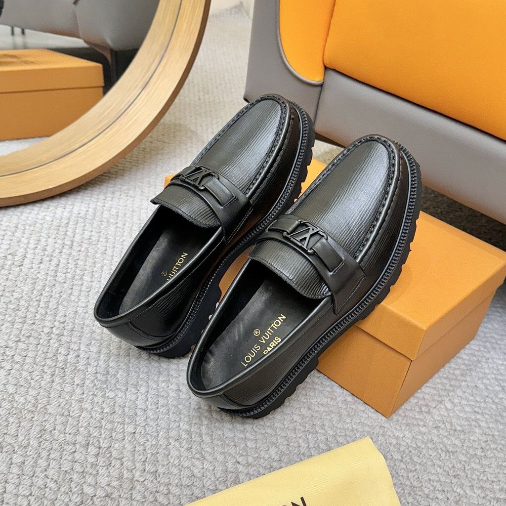 Louis Vuitton Textured Lug Sole Loafers — front