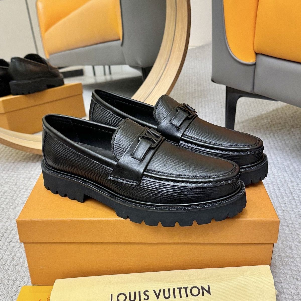 Louis Vuitton Textured Lug Sole Loafers — side