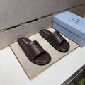 Prada Triangle Detail Slide Sandals — hero