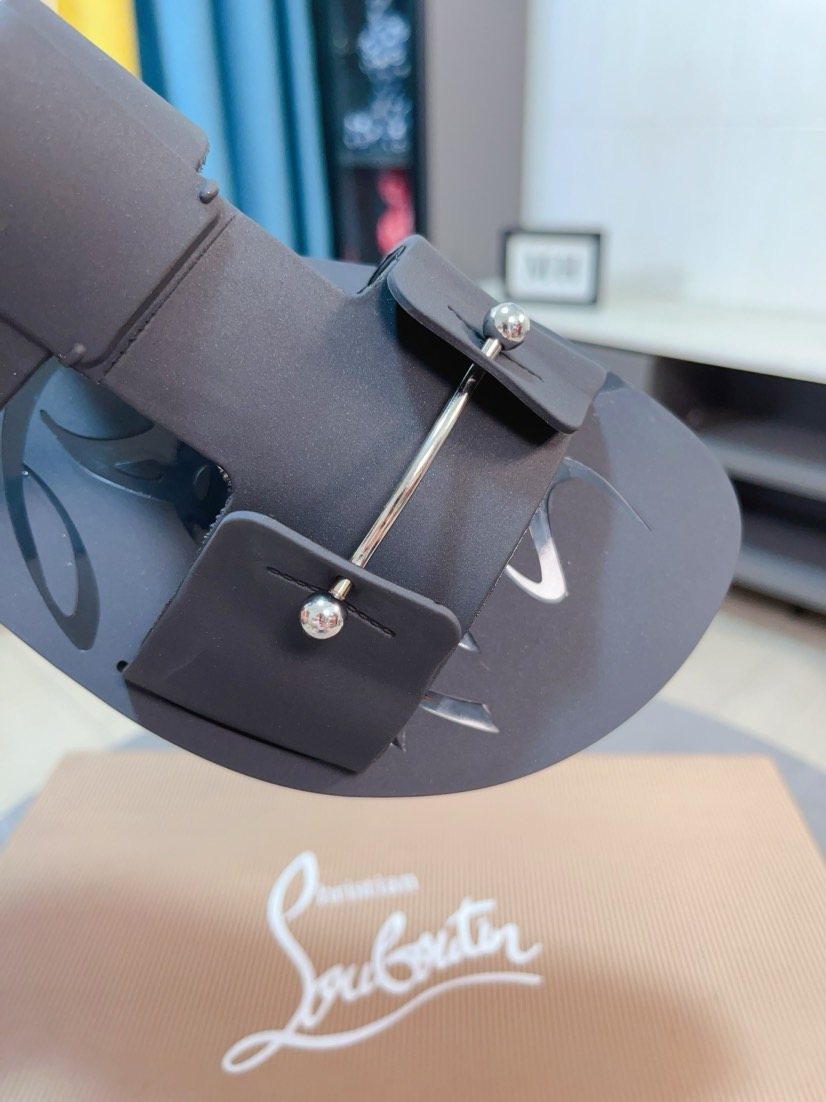 Christian Louboutin Studded Slip-On Sandals — detail