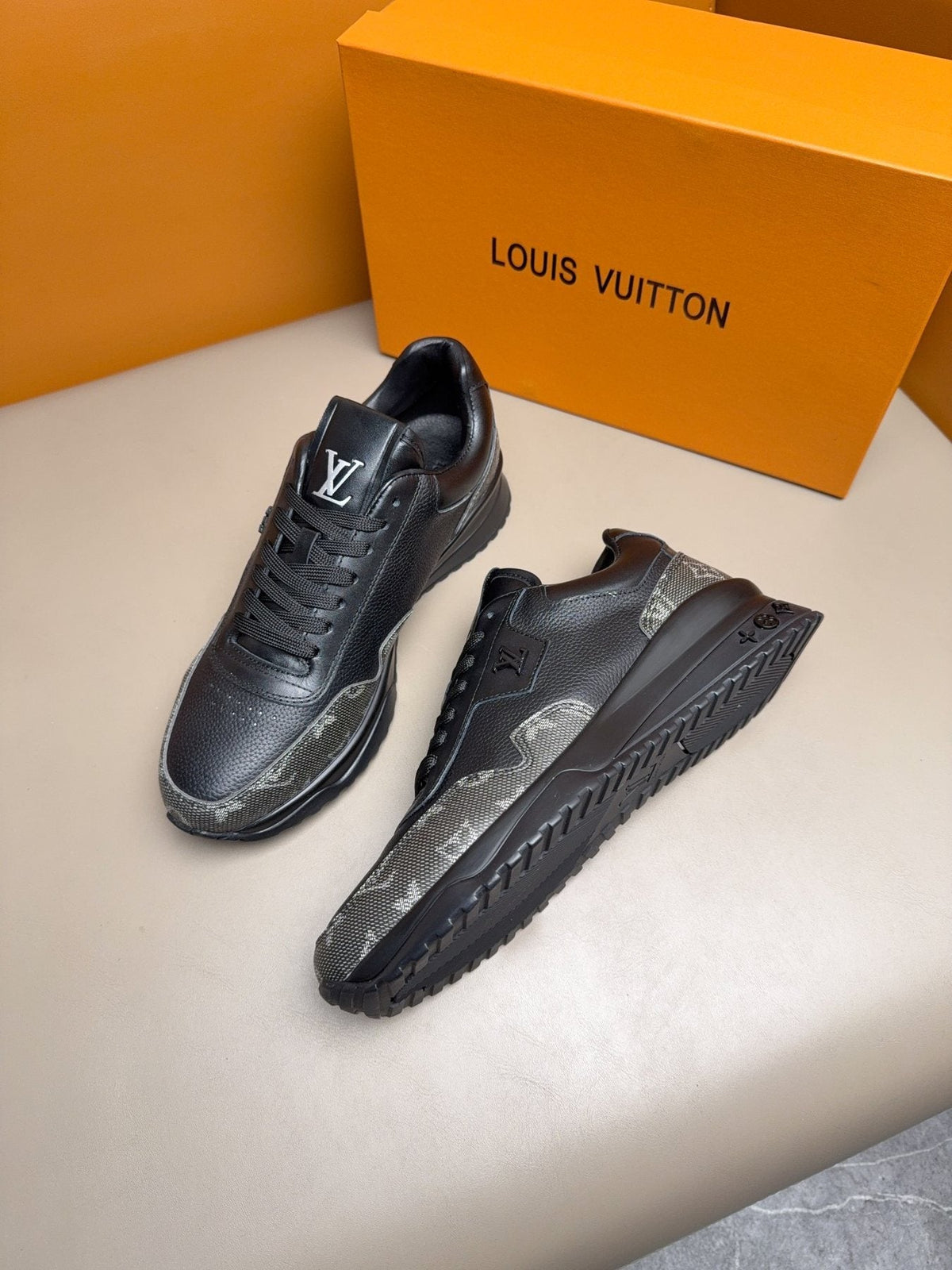 Louis Vuitton Paneled Low-Top Sneakers — model