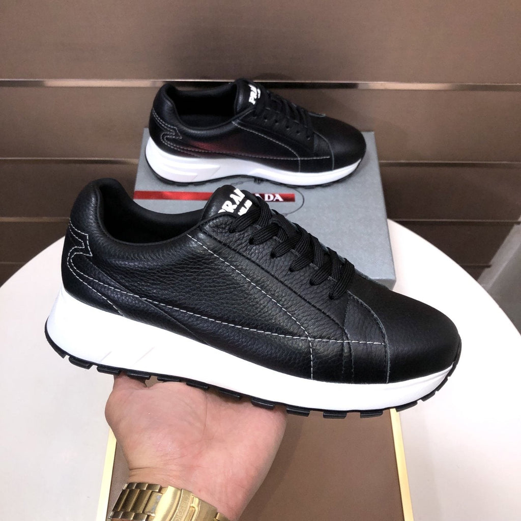PRADA Black Quilted Low-Top Sneakers — front