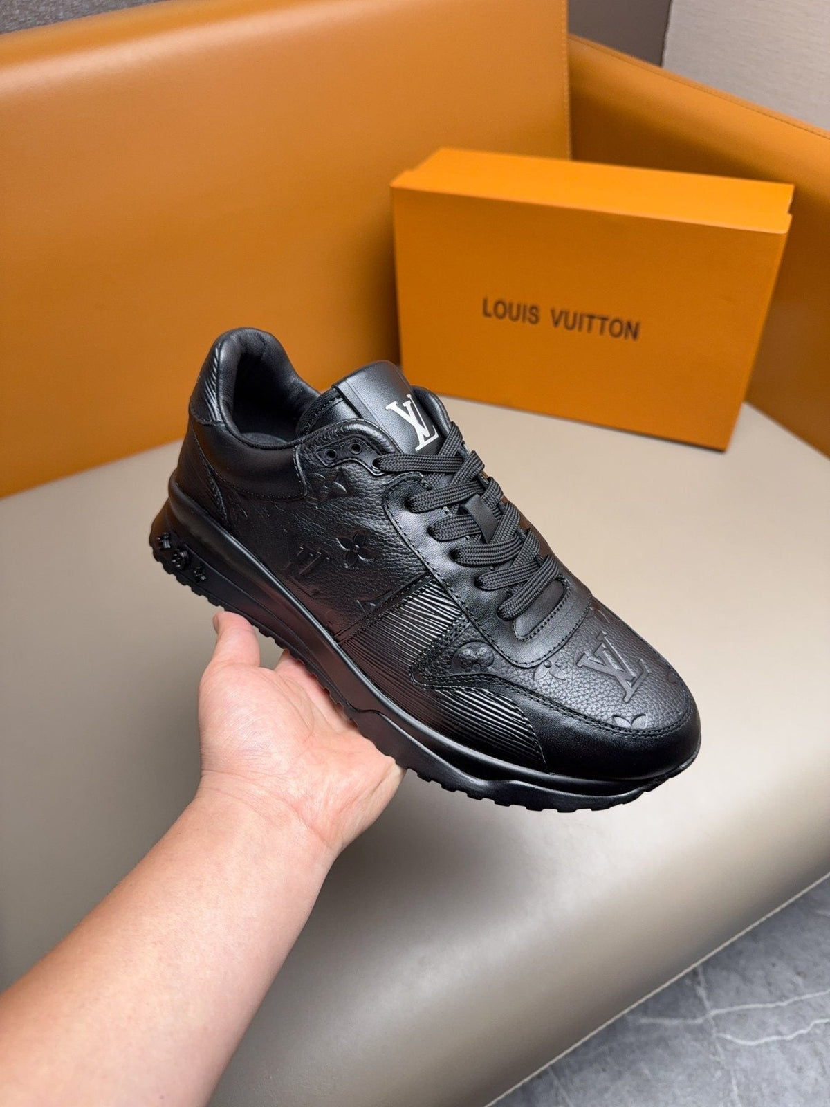 Louis Vuitton Embossed Low-Top Sneakers — side