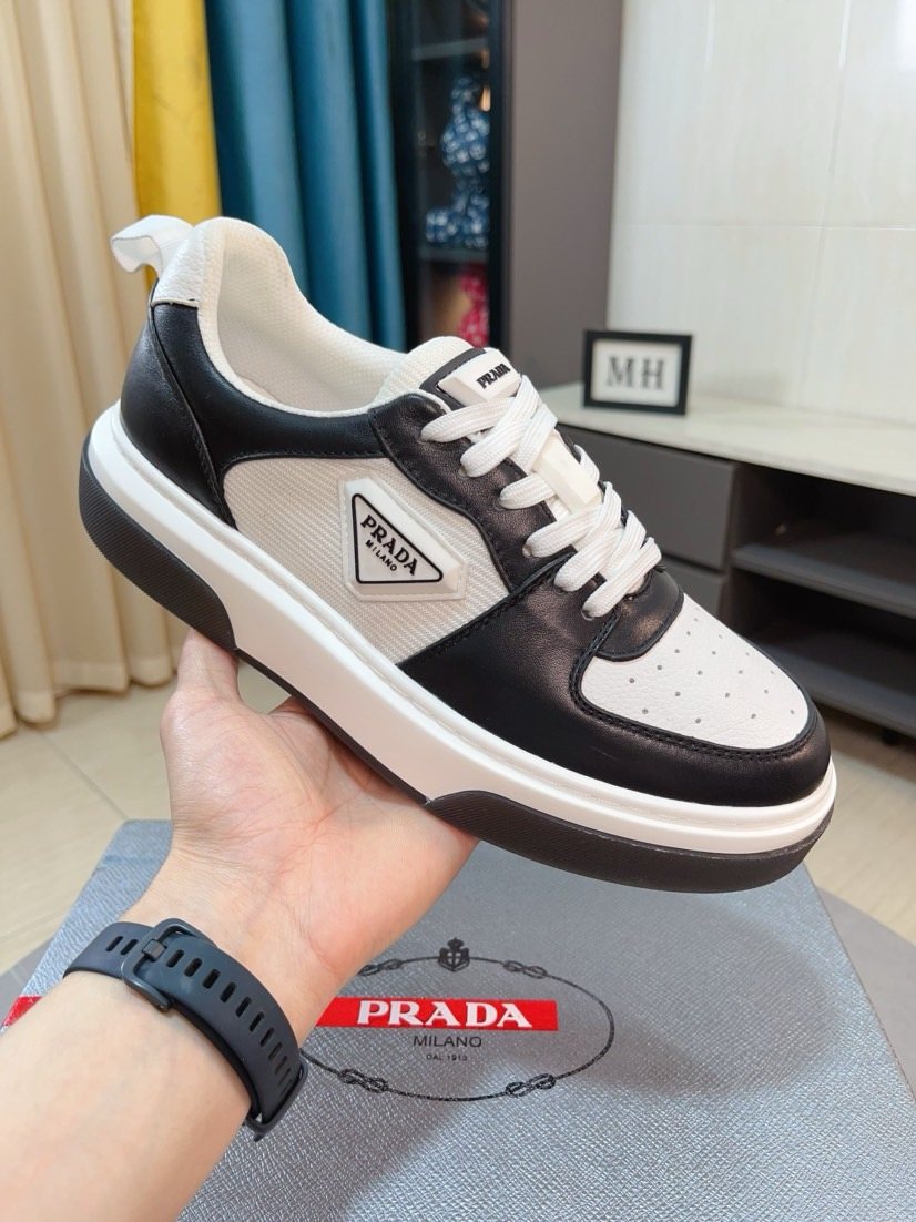 Prada Triangular Logo Sneakers — model