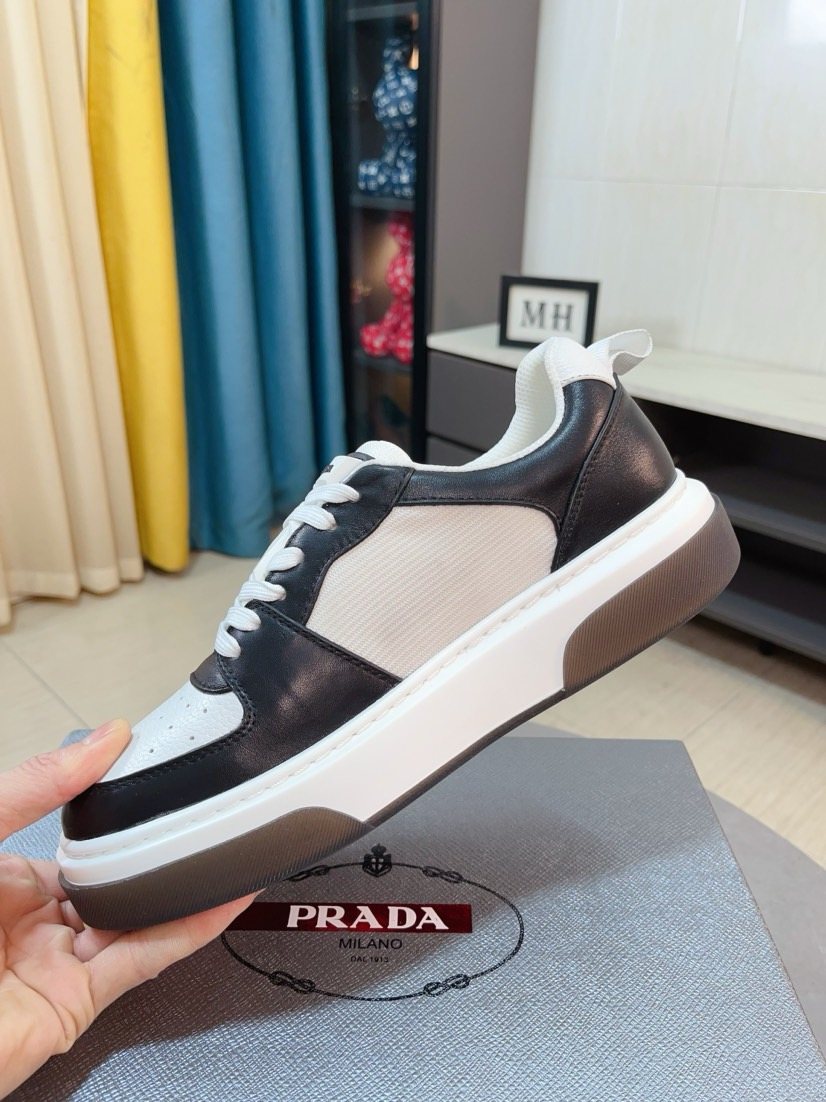 Prada Triangular Logo Sneakers — model