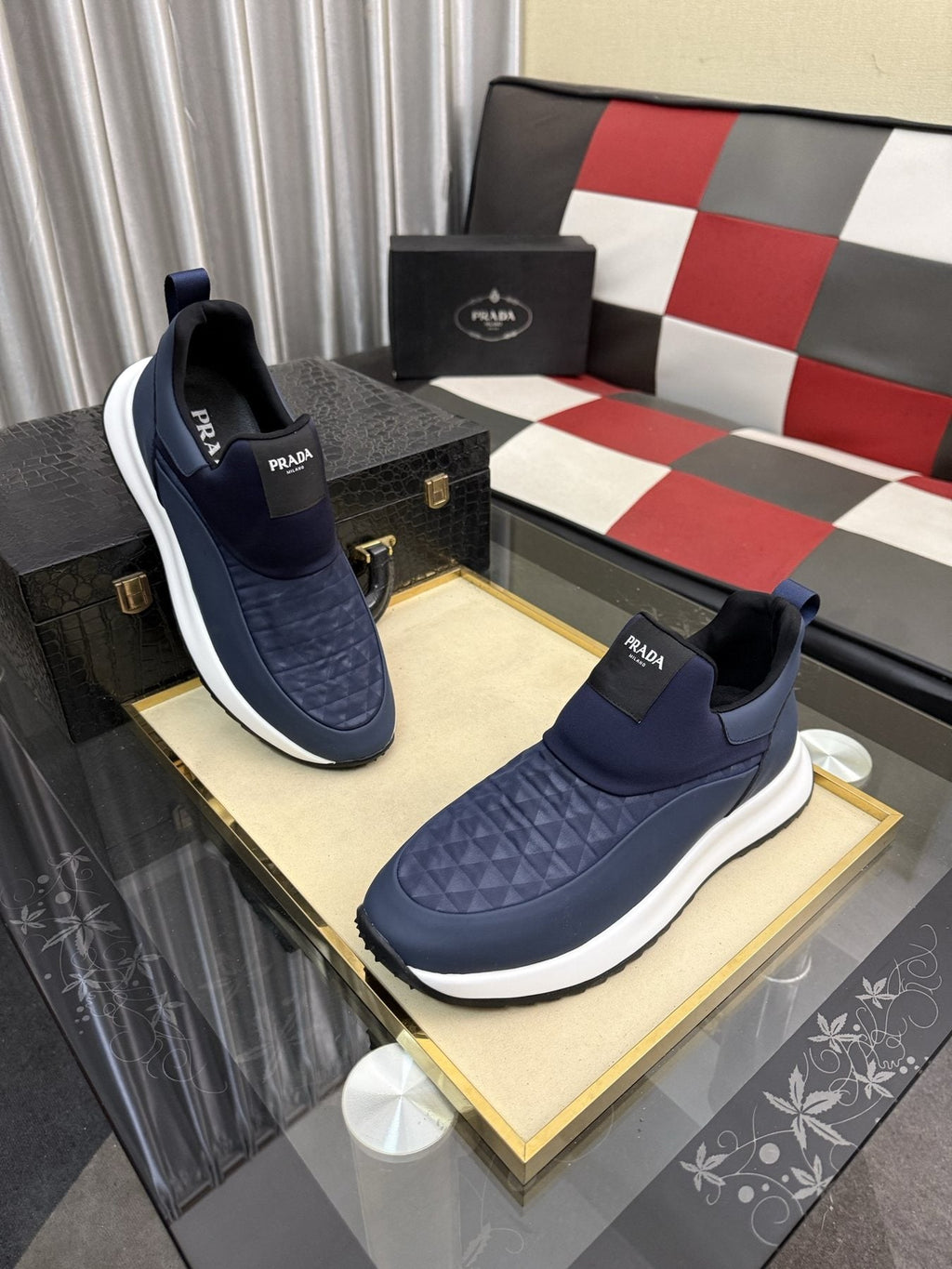 Prada Textured Slip-On Sneakers — side