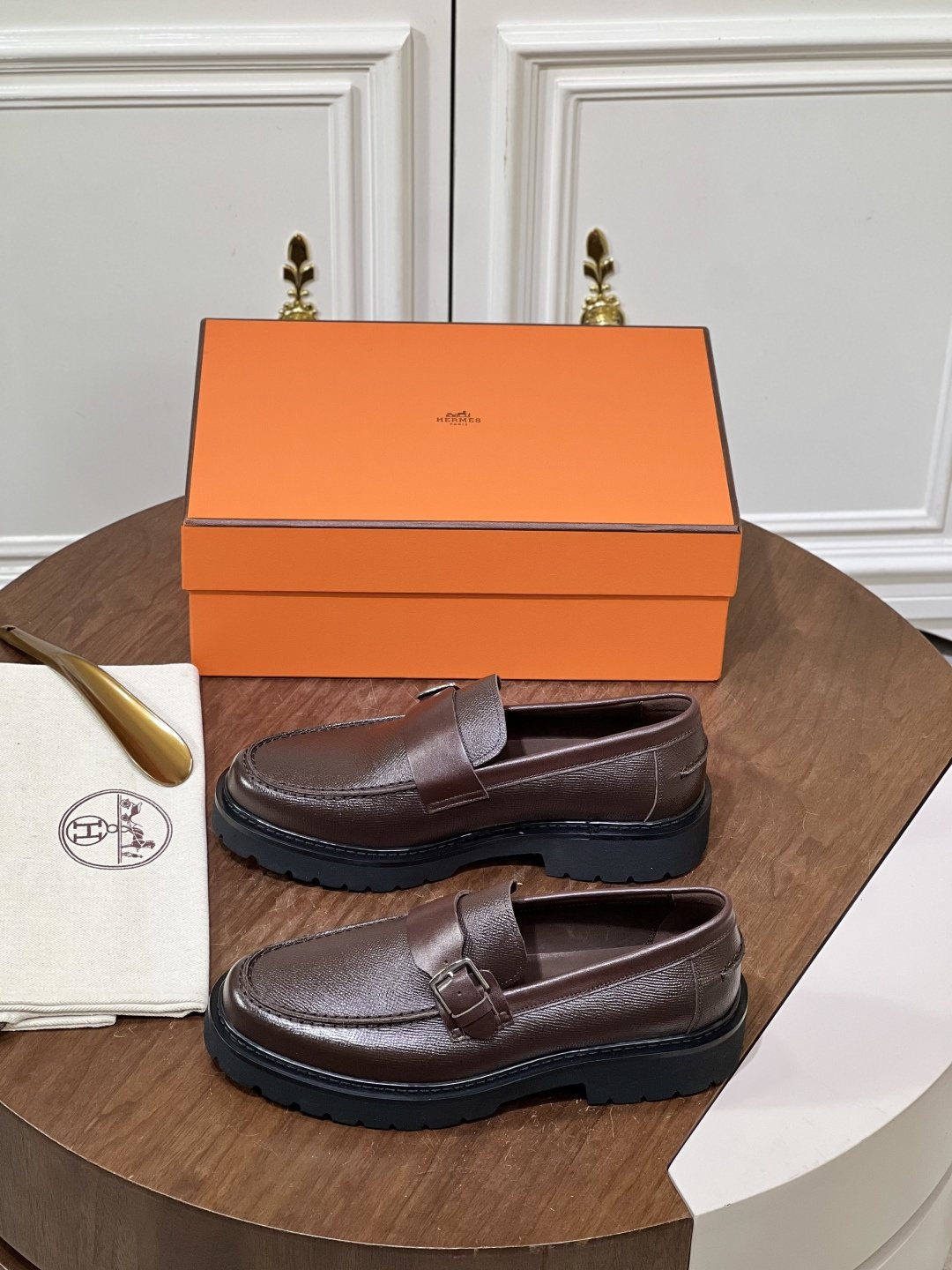 Hermès Men's Metal-Bar Lug Sole Loafers — front