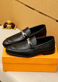 Louis Vuitton Brown Embossed Buckle Loafers — front