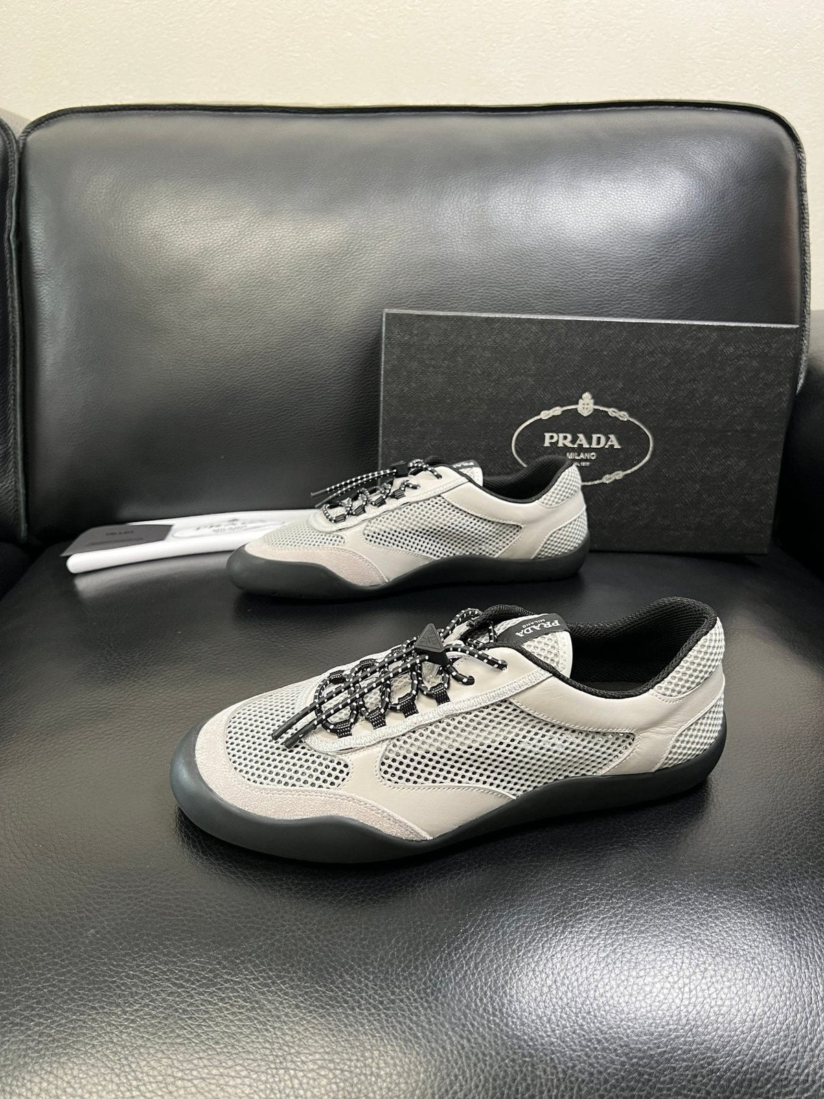 Prada Off-White Perforated Sneakers — side
