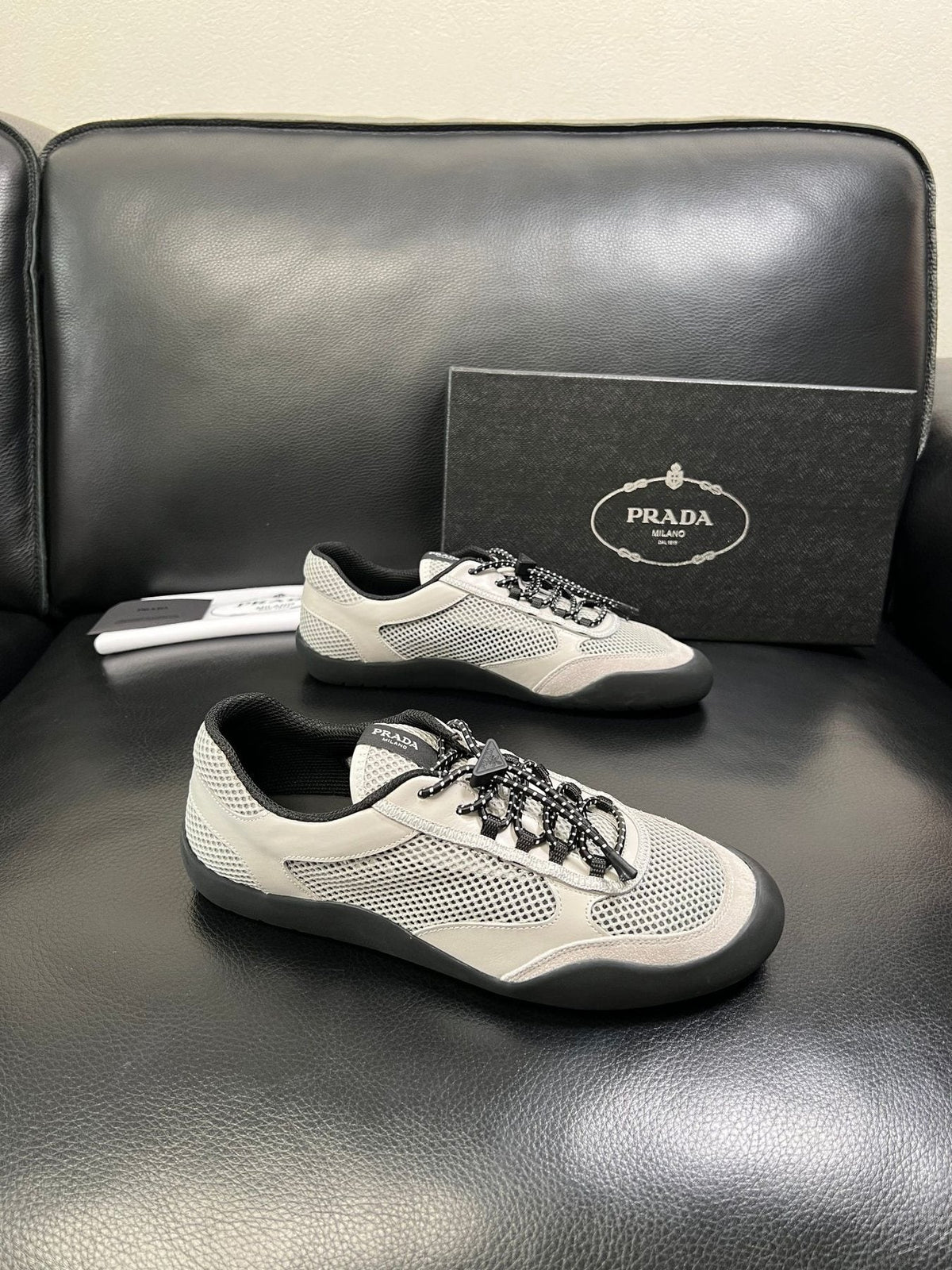 Prada Off-White Perforated Sneakers — front