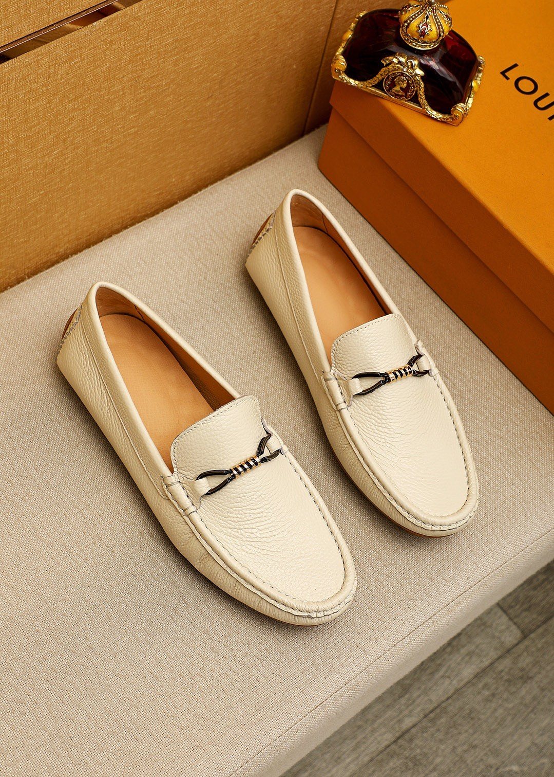 Louis Vuitton Pebble-Grain Bit Loafers — front