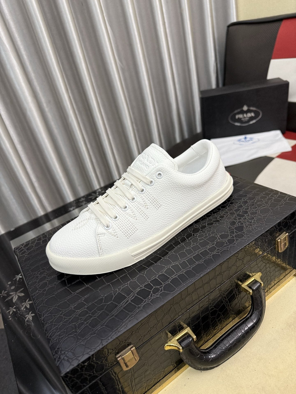 Prada Men's Textured Leather Low-Top Sneakers — hero