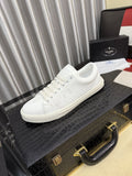 Prada Men's Textured Leather Low-Top Sneakers — hero
