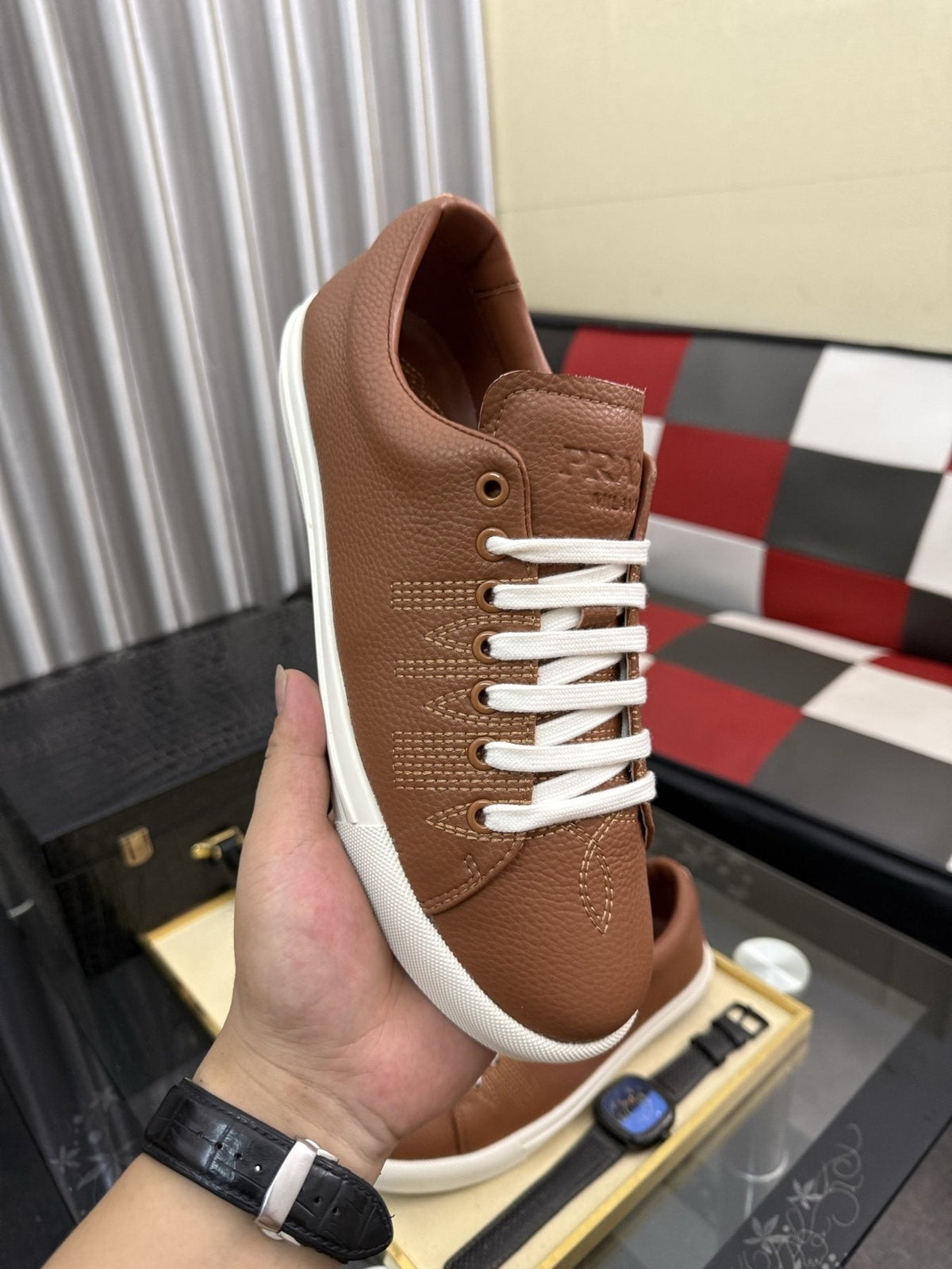 Prada Men's Textured Leather Low-Top Sneakers — model