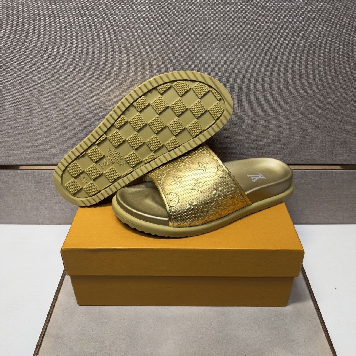 Louis Vuitton Embossed Metallic Slide Sandals — detail