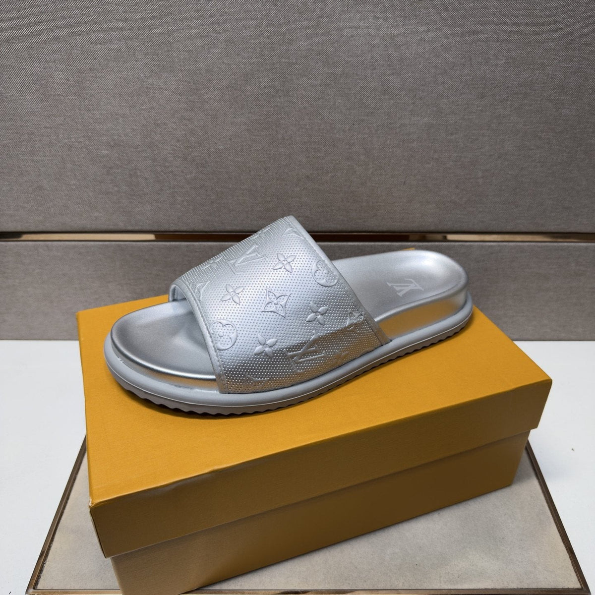 Louis Vuitton Embossed Metallic Slide Sandals — side