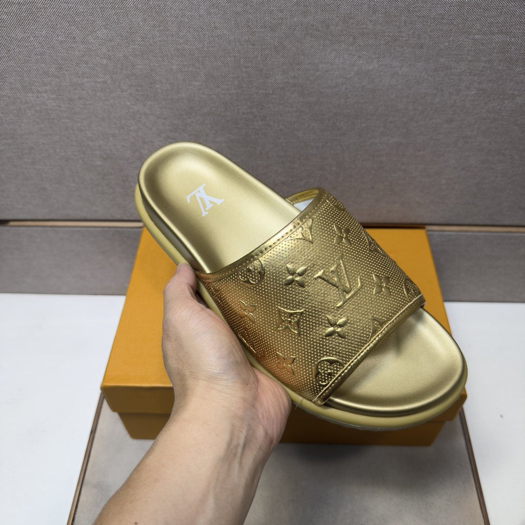 Louis Vuitton Embossed Metallic Slide Sandals — model